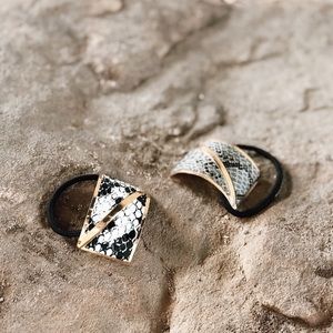 Pair of gold snakeskin hair bands
